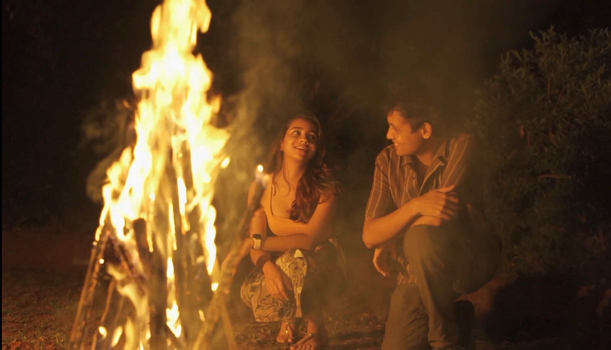 enjoying in nature by a bonfire.